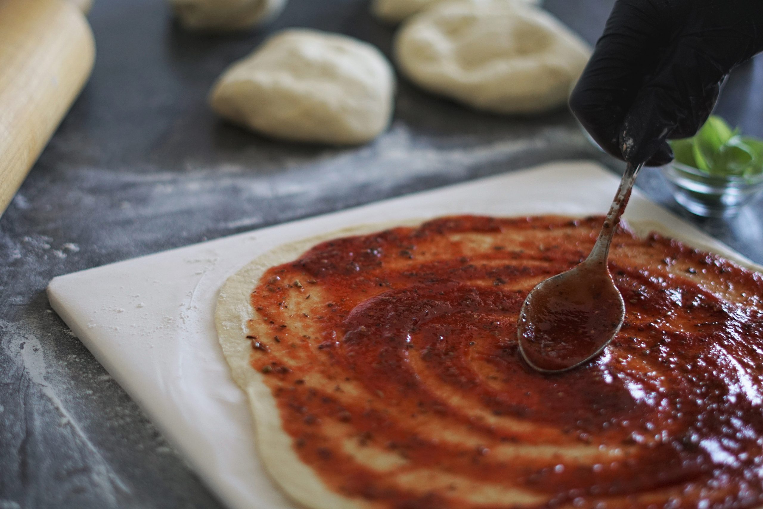 Ooni fired pizza being made