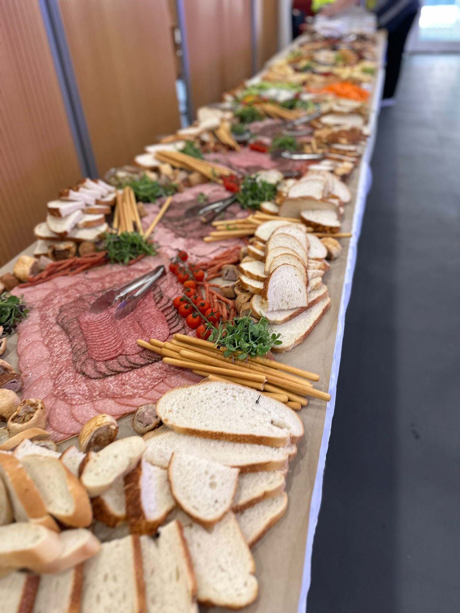 Breads and cheeses on a grazing table